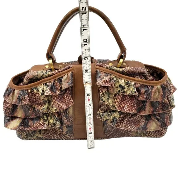 Rare Hard‎ toFind Vintage Jessica Simpson faux python purse. Great condition